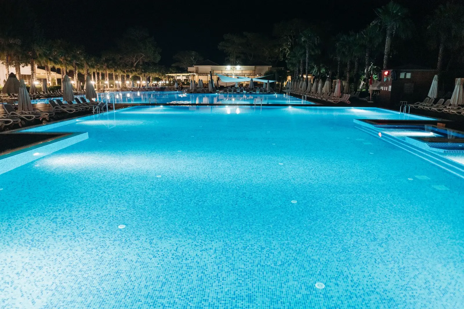 Sparkling clean swimming pool with crystal-clear water