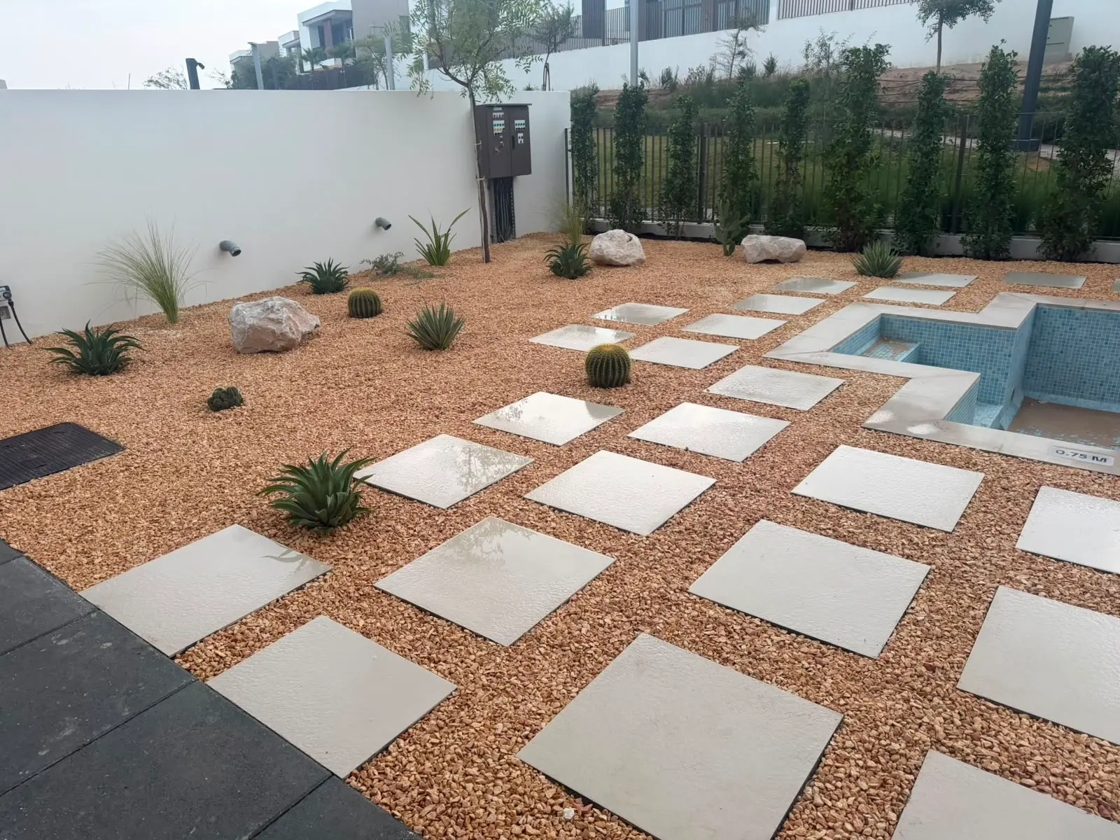 Swimming pool and deck serviced and maintained at a villa